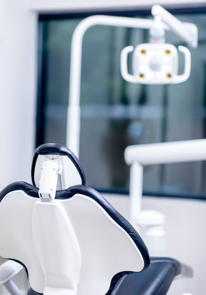 Dental chair in a modern clinic setting.